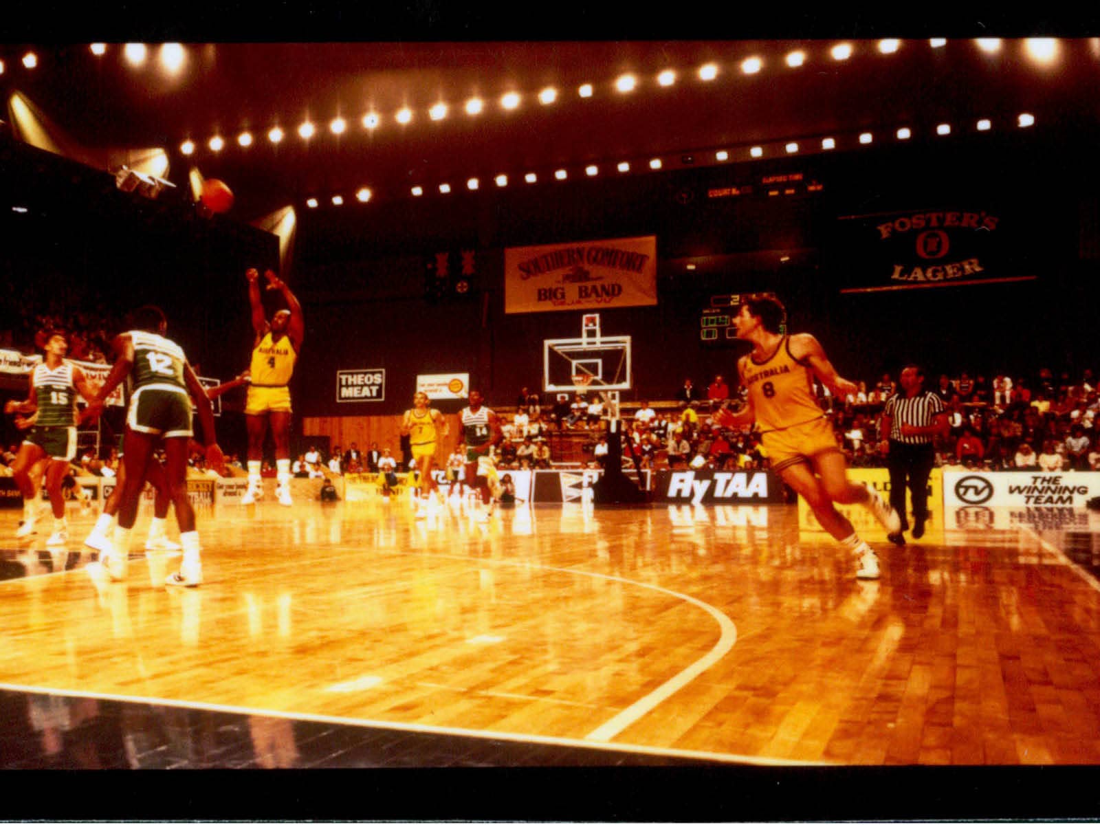 A historic photo of a basketball game in the 1980s