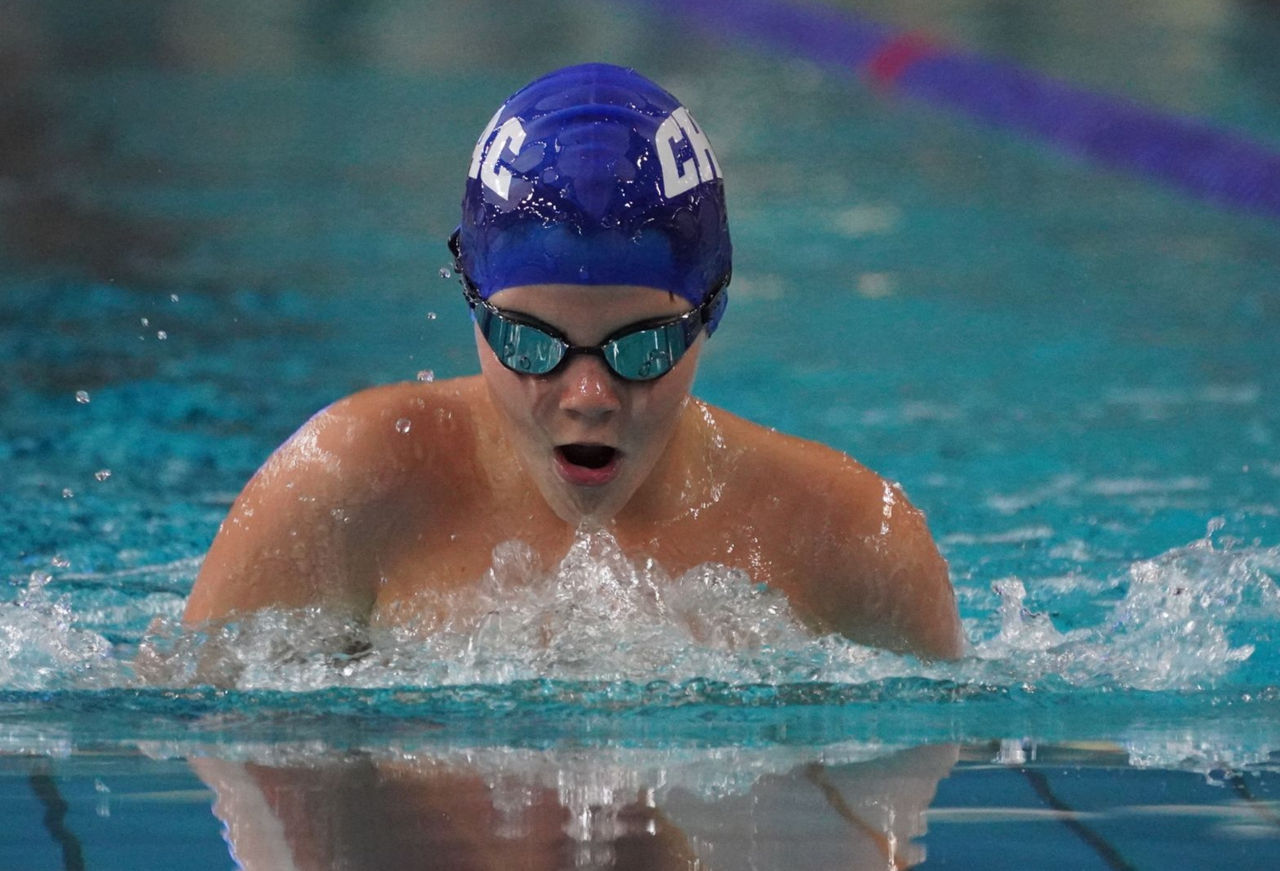 Boy swimming breaststroke